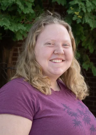 Rachel smiling at the camera