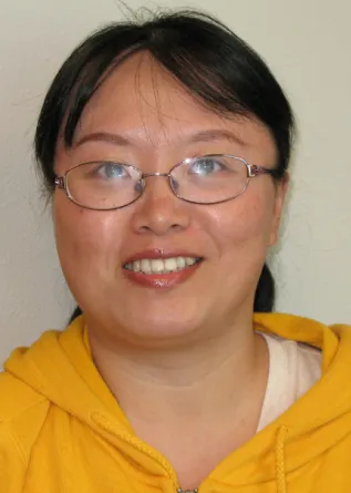 Chunju Gu smiling confidently into the camera.