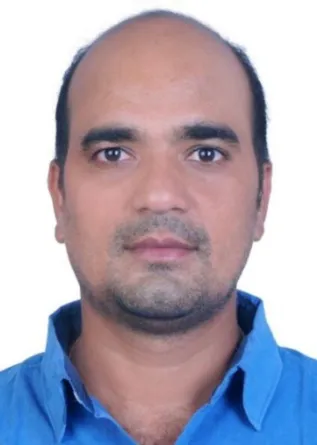 Ravi Arukula smiling confidently into the camera.