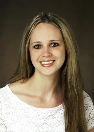 Baggett smiling confidently at camera