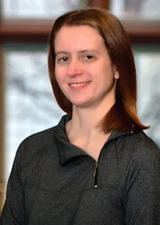 Anne smiling at the camera.