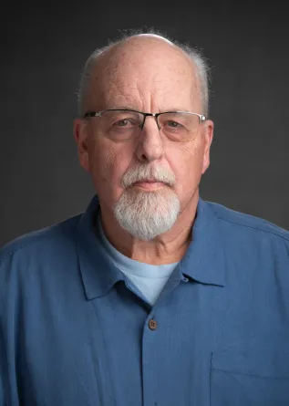 Brad not smiling at the camera