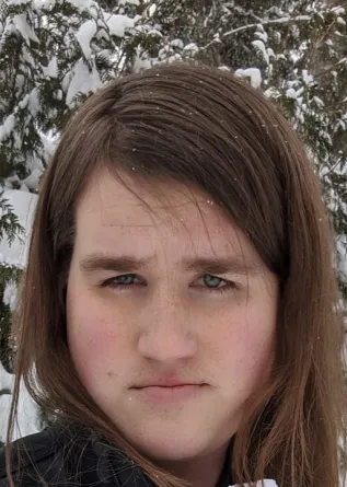 Jon smiling at the camera.