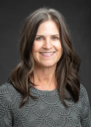 Woman in a grey shirt