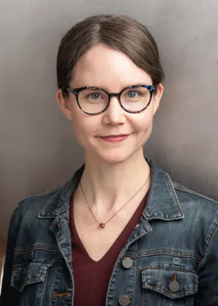 Woman in denim jacket