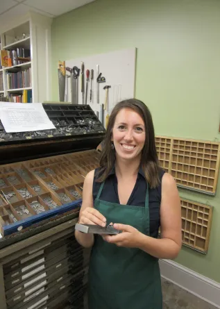 Amy Gore smiling confidently at camera.