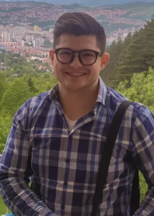 Alen Fejzic smiling confidently at camera. 