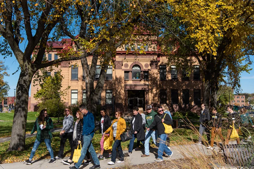 students walking on campus