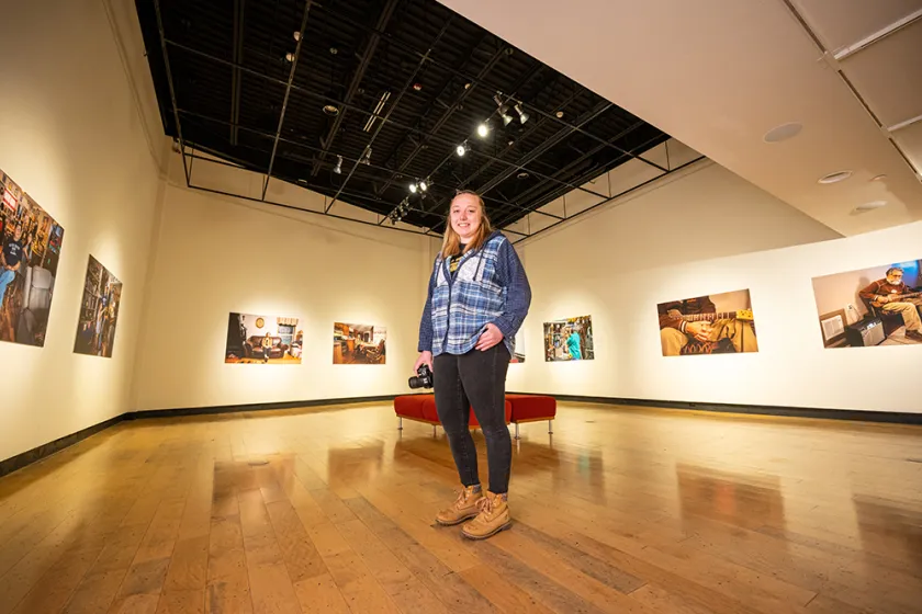 Maria Brien standing in an art gallery