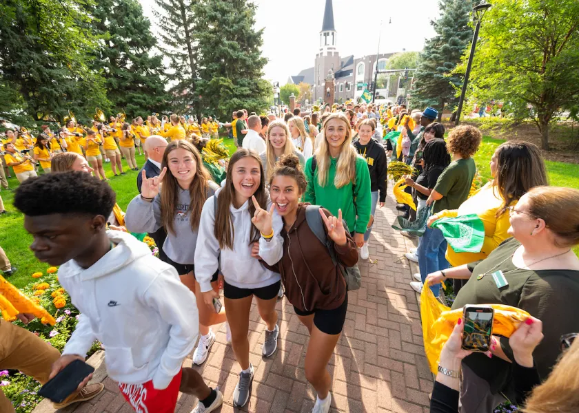 Students walk through main gates at NDSU during first day of classes