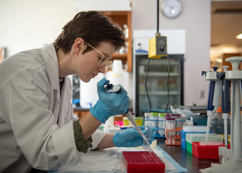 Elena Linster studying in a biological science lab
