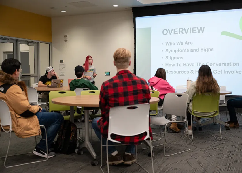 students watching a presentation in a classroom