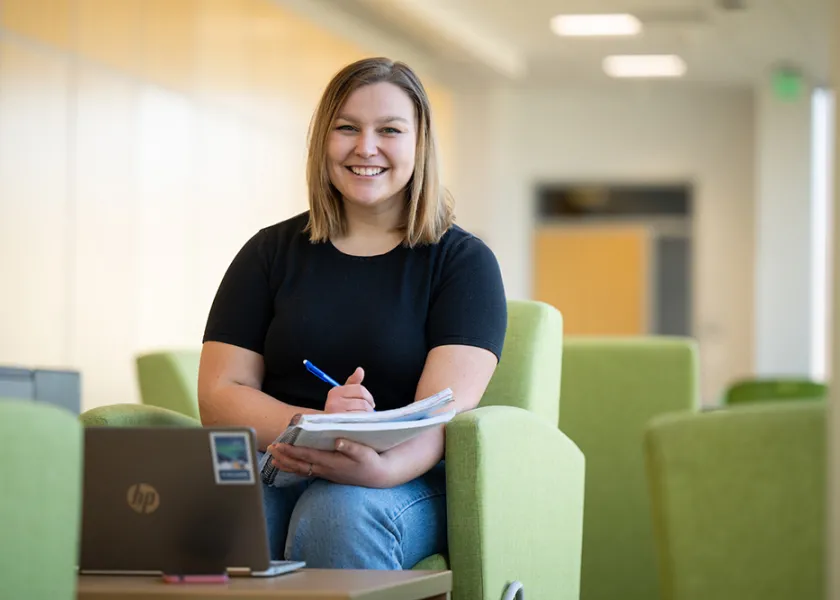 Grace Schmidt smiling at camera