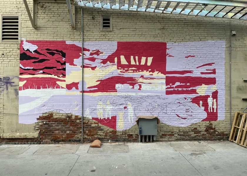 The mural, located in Roberts Alley on the brick wall behind the Chase Bank building, is a depiction of downtown Fargo’s Dike East River Park, with the vantage point of views west toward Fargo