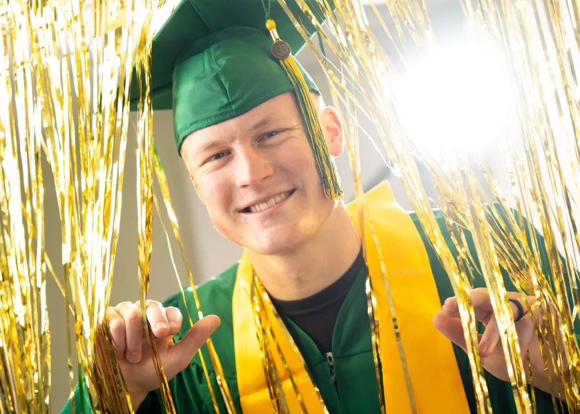 ndsu graduate smiling for the camera