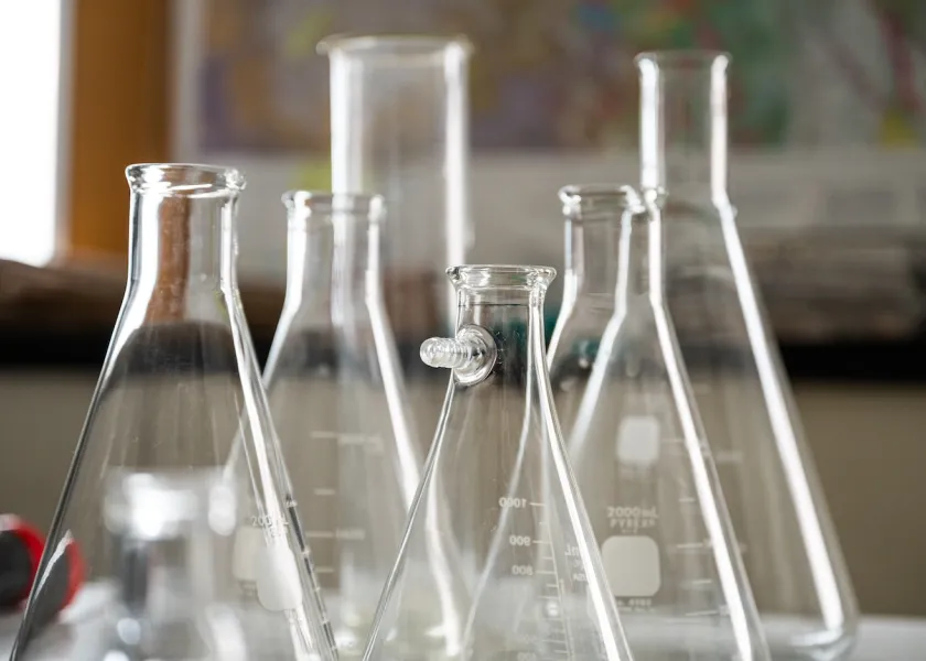 empty chemistry beakers on a table