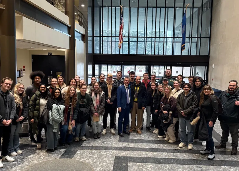 a group of NDSU architecture students and faculty at the State Capitol