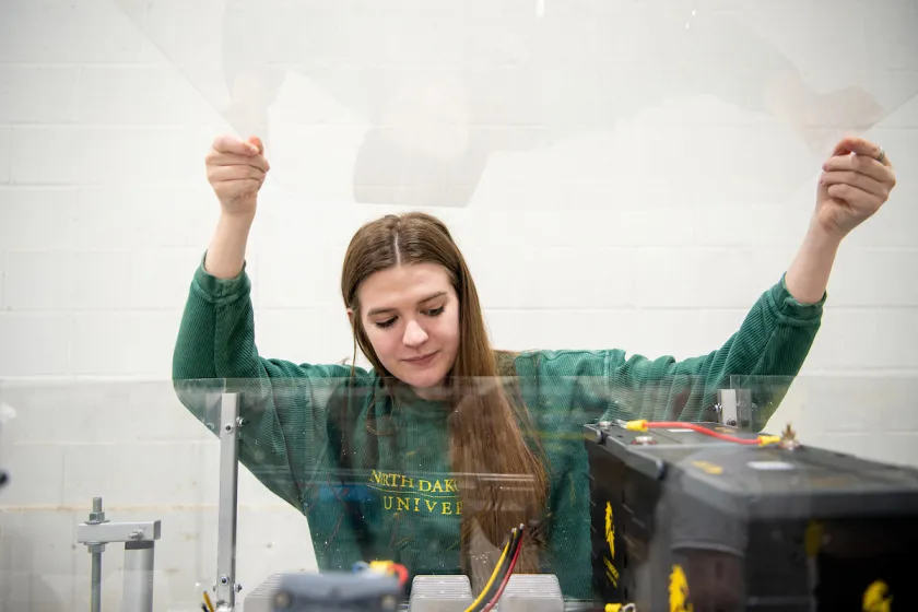 Engineering student working in a lab