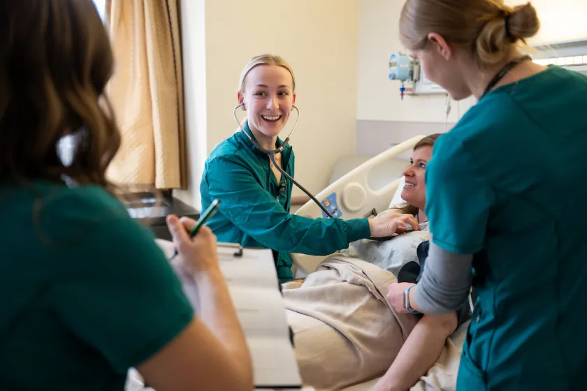 nursing students practicing patient care