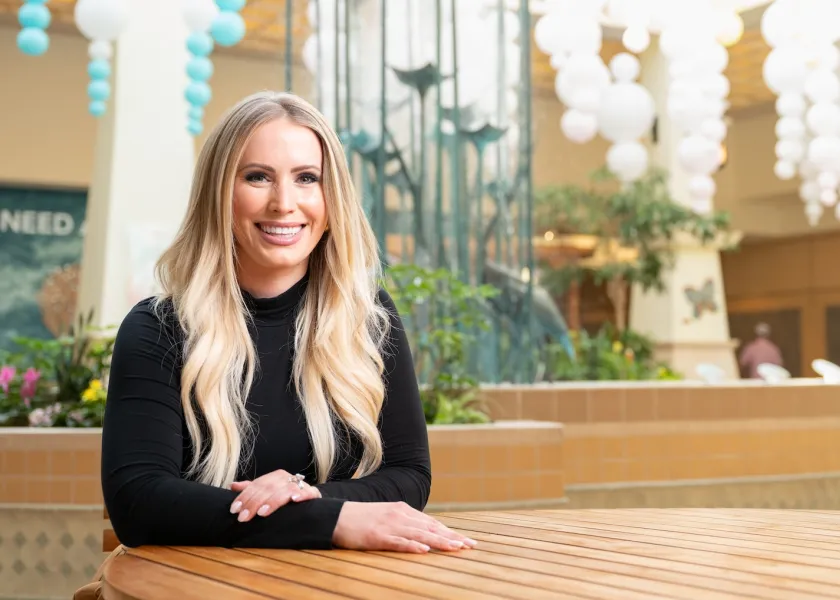 Alissa Adams sitting at a table
