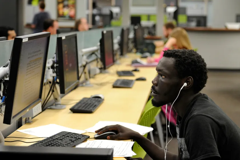 student working in a computer lab