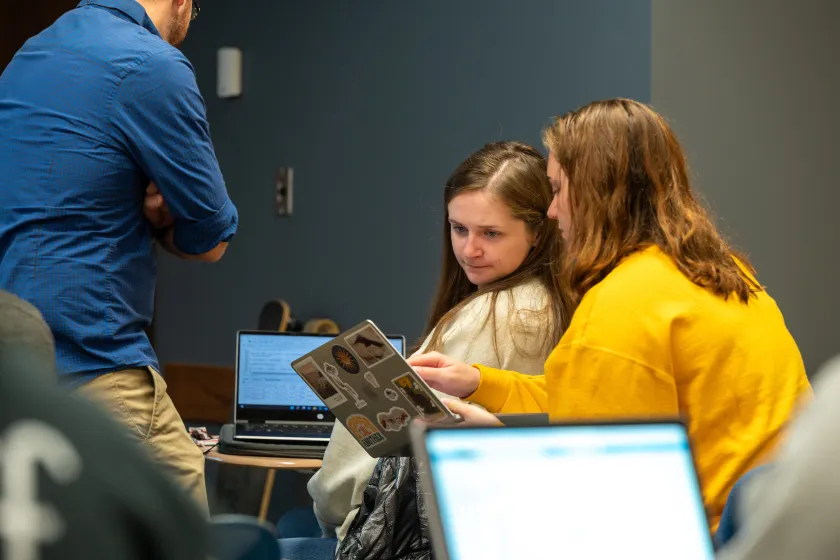 students working on an assignment in class