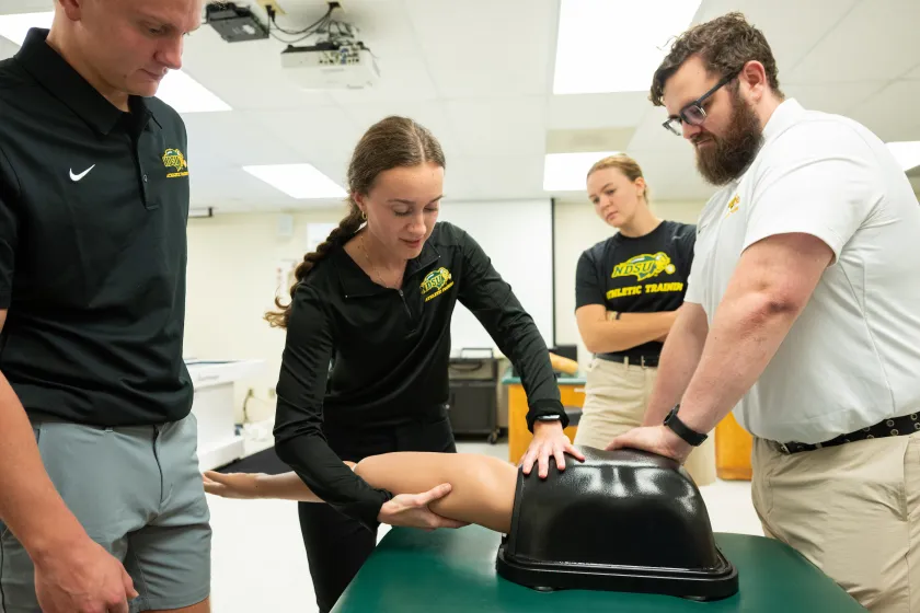Athletic Training students get hands-on experience working on a special mannequin 