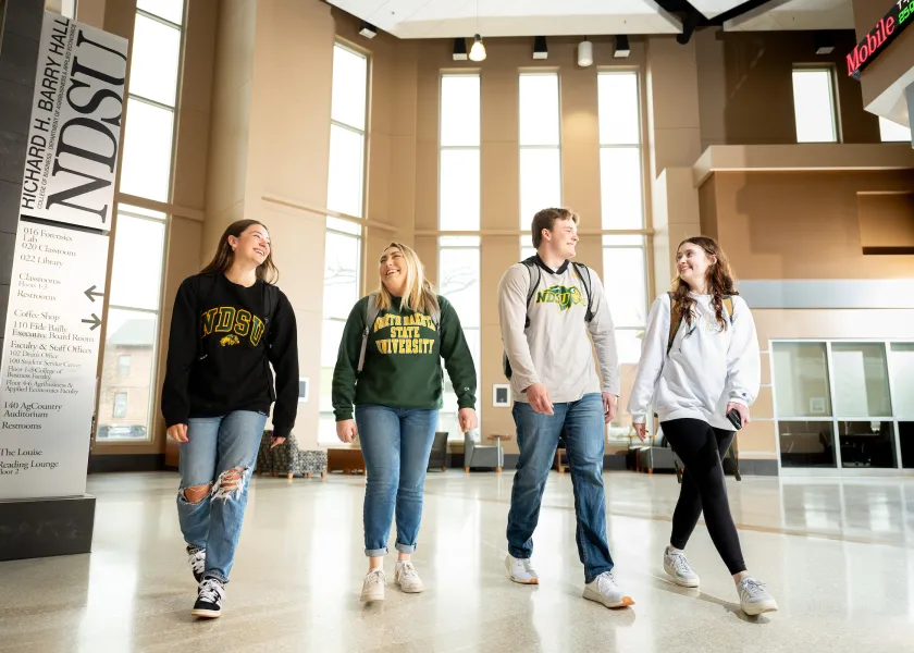 Students walking inside of Barry Hall