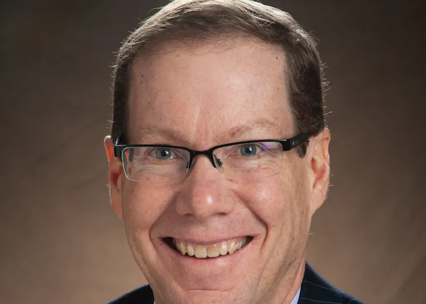 Headshot of Menard Family Director, John Bitzan, Ph.D.