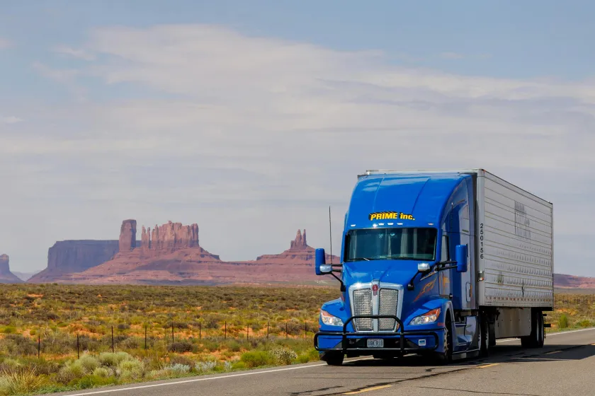 semi truck driving down the highway