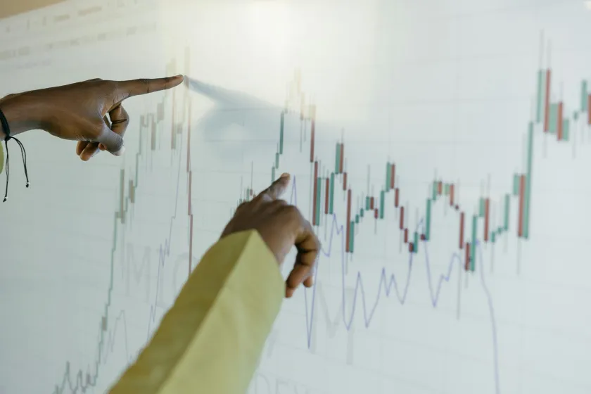 students evaluating statistics on a chart