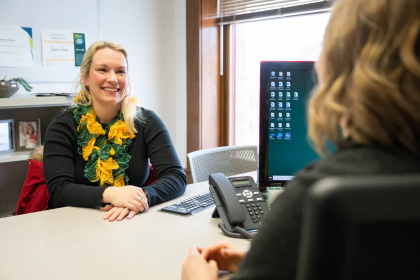 Degree Completion Career Advisor working with a student