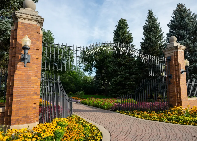 NDSU's main gates on the corner of University and 12th Ave.