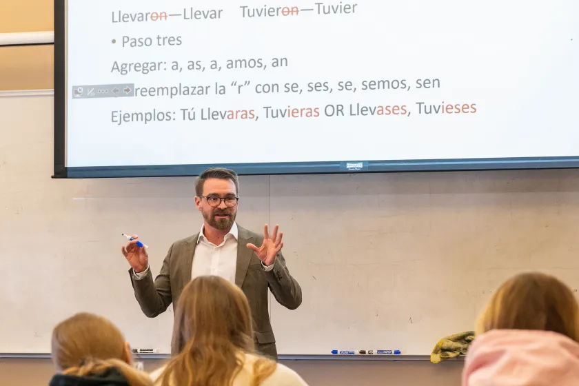 Spanish faculty giving a class lecture