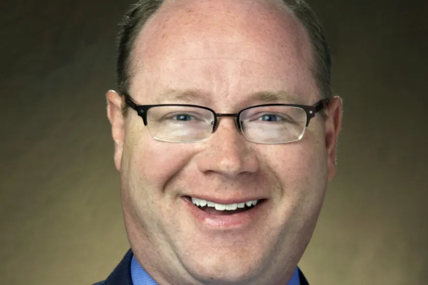 headshot of Travis Hoffman