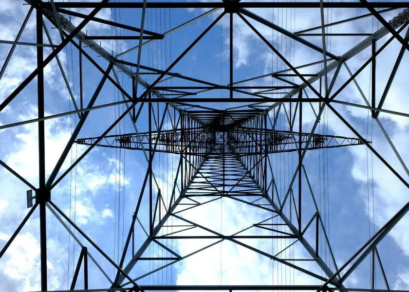 looking up through the bottom of an energy tower