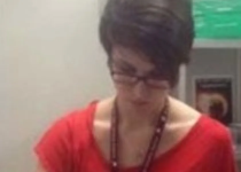 Chelsea Rodriguez sorting mealworm beetles.