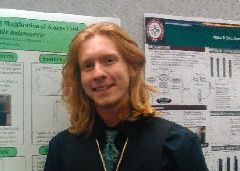 Michael presenting a poster and looking great!