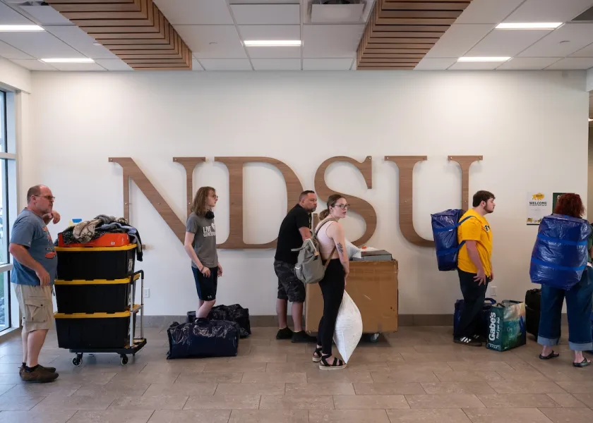 Students and parents moving into an NDSU residence hall.