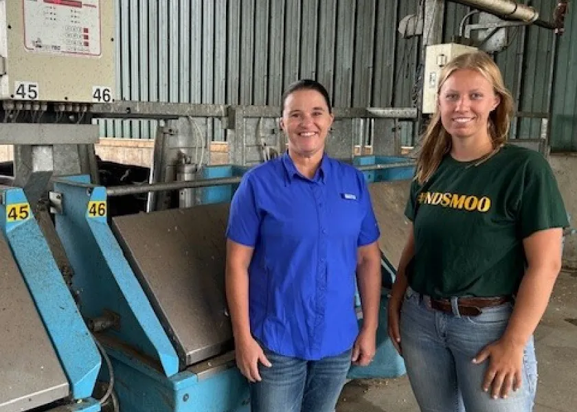 BCRC Staff in front of steer feeding machines