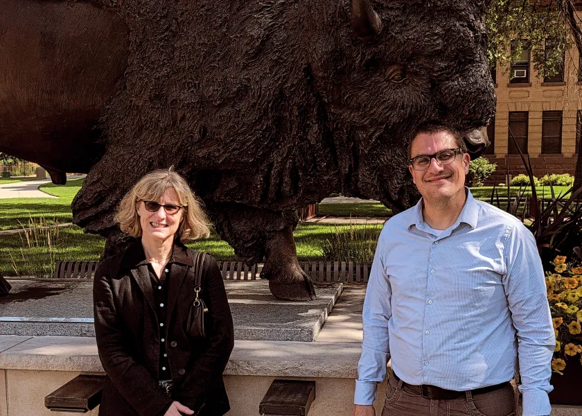 Gunlogson scholars of regional studies Molly Rozum, University of South Dakota, and David Vail, University of Nebraska-Kearney, pose in front of the Bison statue during their research visit to NDSU in July 2025.