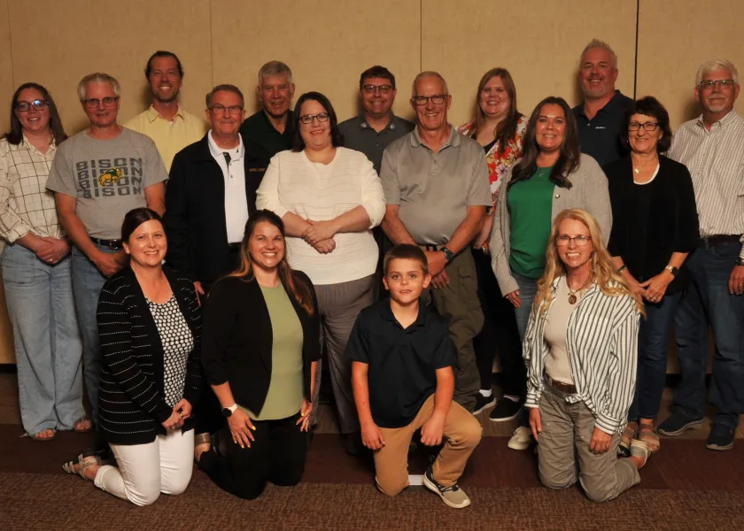 A group of people smiling