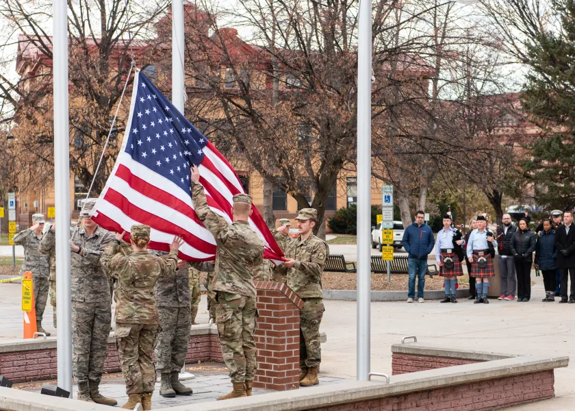 Cadets from NDSU’s Air Force ROTC honor guard perform in a flag raising ceremony outside of NDSU's Memorial Union.