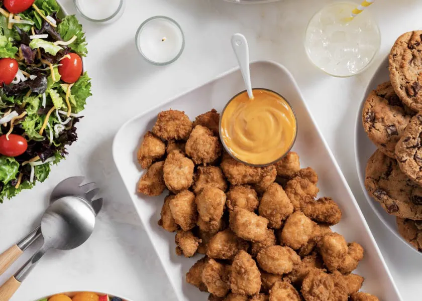 CFA Catering Nuggets on a white tray with dipping sauce