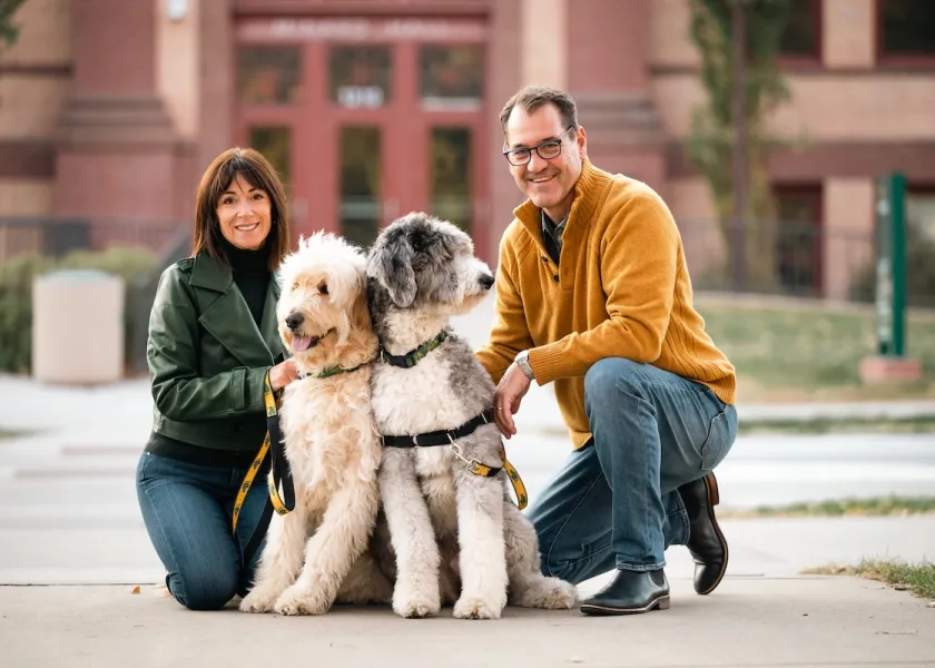 President David Cook and Kate Cook with their dogs.