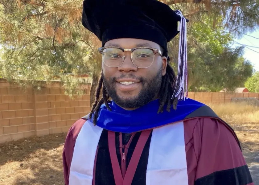 Ray Berry smiling confidently at camera. 