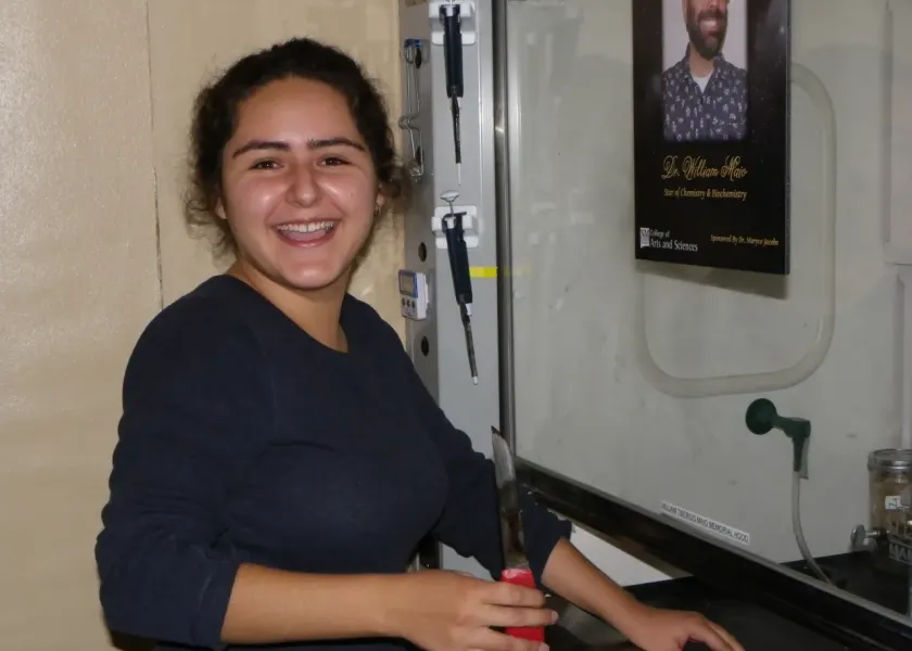 Angel Padilla smiling confidently at camera.