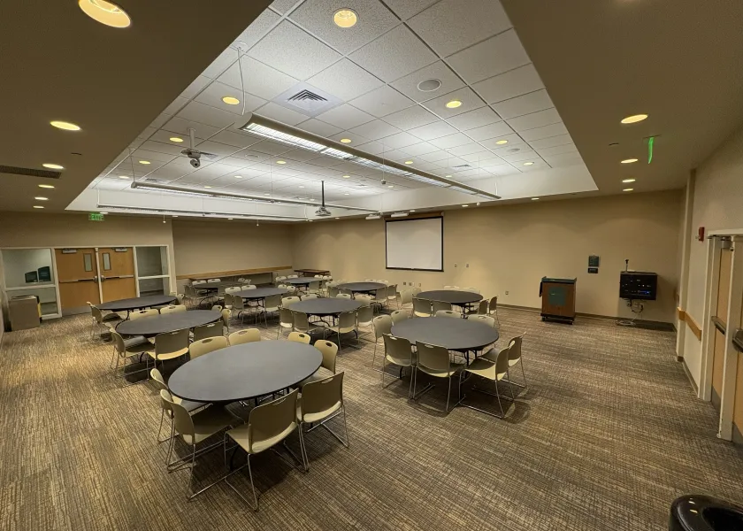 Sahnish room setup with round tables