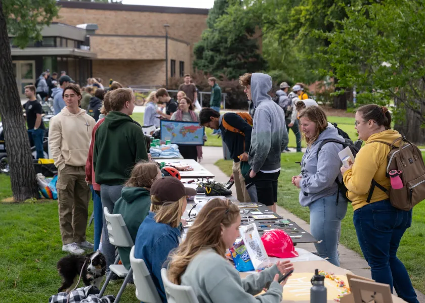 NDSU students gather outside of the library to learn more about student organizations.