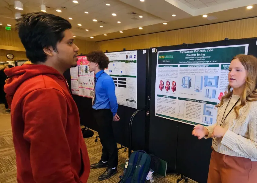 students talk during the Student Research Days 2025 poster session 